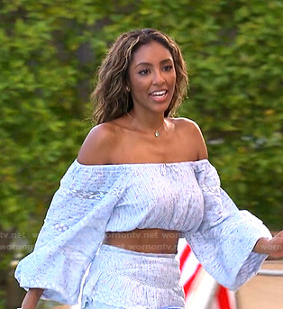 Tayshia's light blue floral off-shoulder top and mini skirt on The Bachelorette