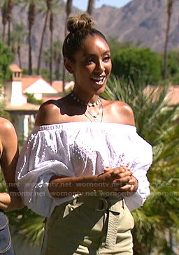 Tayshia's white swiss dot off-shoulder top and green shorts on The Bachelorette