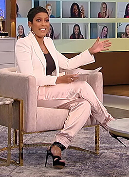 Tamron's pink satin pants and white blazer on Tamron Hall Show