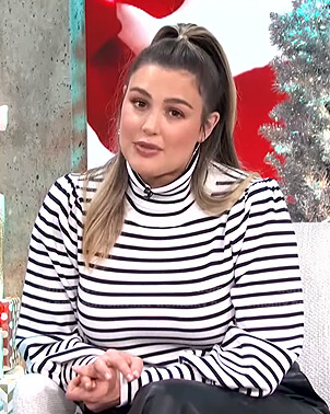 Carissa's white striped turtleneck top on E! News Daily Pop