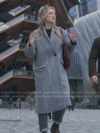 Cassie's grey coat on The Flight Attendant