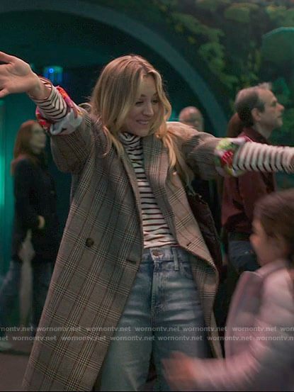 Cassie's plaid coat on The Flight Attendant