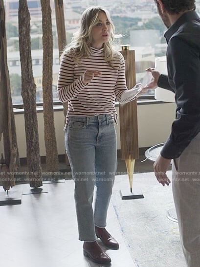 Cassie's striped turtleneck top on The Flight Attendant