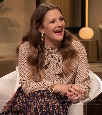 Drew's geometric print tie neck blouse on The Drew Barrymore Show