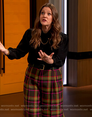 Drew's black chain embellished blouse and plaid pants on The Drew Barrymore Show