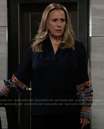 Laura's blue embroidered wrap blouse on General Hospital