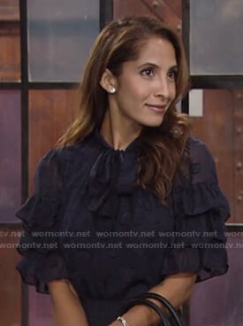 Lily's navy tie neck ruffled sleeve top on The Young and the Restless