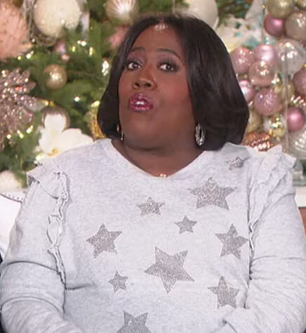 Sheryl's gray star ruffle sweater on The Talk