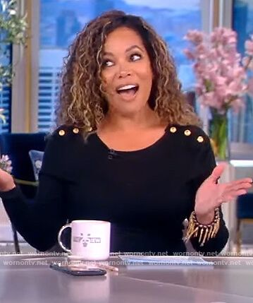 Sunny's black button embellished sweater on The View