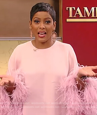 Tamron's pink feather trim dress on Tamron Hall Show