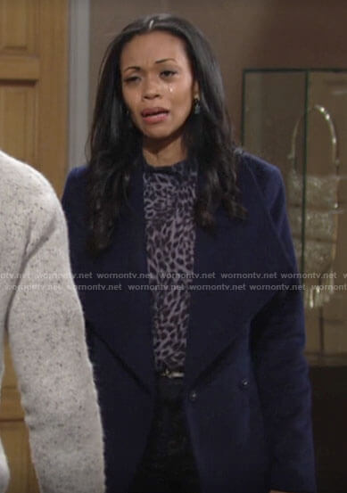 Amanda's blue leopard print blouse and navy coat on The Young and the Restless