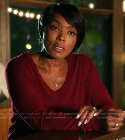 Athena's red v-neck sweater on 9-1-1