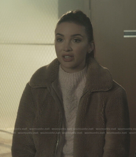 Bess's pink cable knit mock neck sweater on Nancy Drew