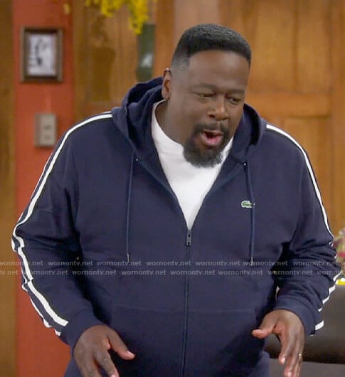 Calvin's navy track jacket on The Neighborhood