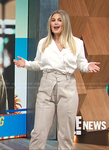 Carissa's white blouse and leather belted pants on E! News Daily Pop