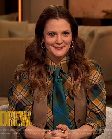 Drew's green plaid blouse and leather skirt on The Drew Barrymore Show