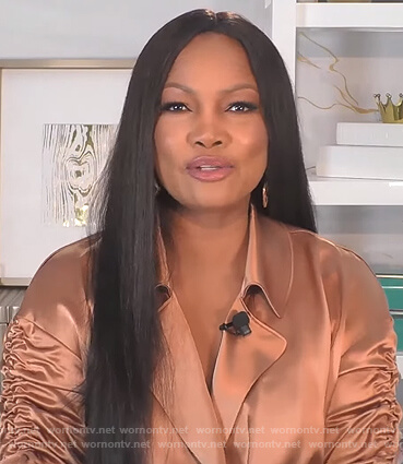 Garcelle's brown satin ruched sleeve top on The Real
