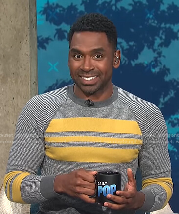 Justin's gray and yellow stripe sweater on E! News Daily Pop