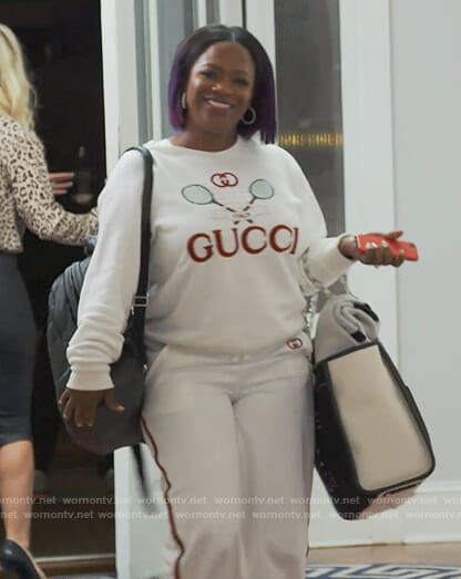 Kandi's white Gucci tennis sweatshirt on The Real Housewives of Atlanta