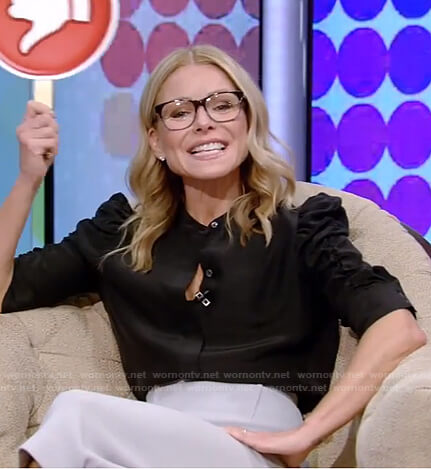Kelly's black puff sleeve blouse and pencil skirt on Live with Kelly and Ryan