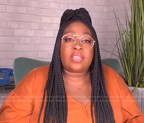 Loni's orange suede jumpsuit on The Real
