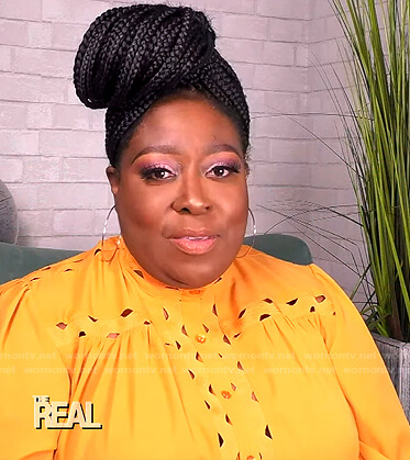 Loni's yellow cutout blouse on The Real