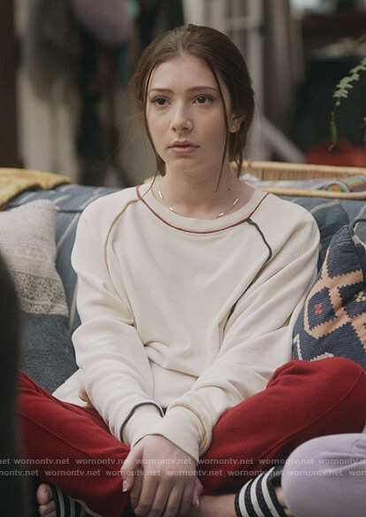 Natalie's white contrast piping sweatshirt on The Unicorn