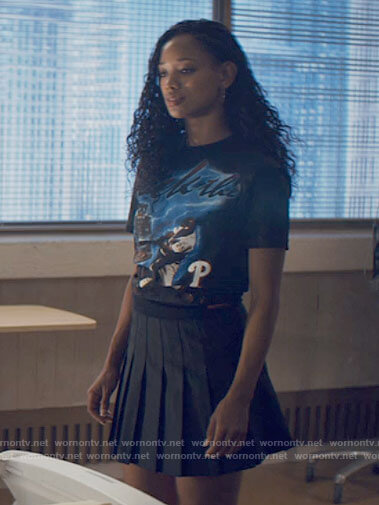 Neveah's graphic tee and pleated skirt on Tiny Pretty Things