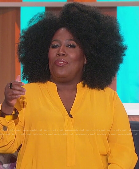 Sheryl's yellow v-neck top on The Talk