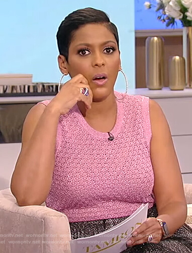 Tamron's pink metallic knit top and pleated skirt on Tamron Hall Show