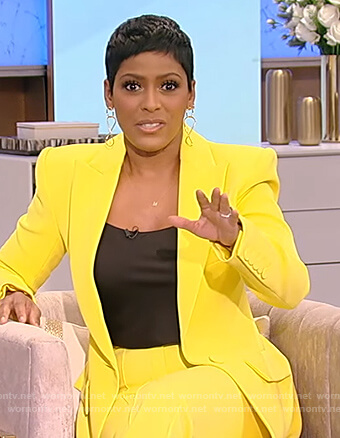 Tamron's yellow blazer and pants on Tamron Hall Show