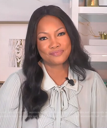 Garcelle's mint ruffle front blouse on The Real