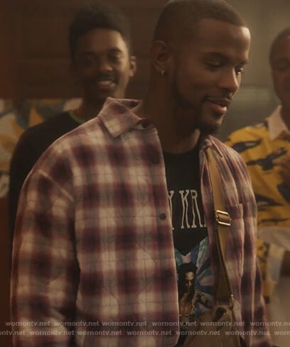 Aaron's plaid shirt and Lenny Kravitz graphic tee on Grown-ish