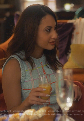 Ana's blue plaid sleeveless sweater on Grown-ish
