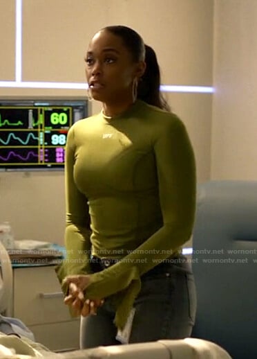 Anissa's green ruffle cuff top on Black Lightning