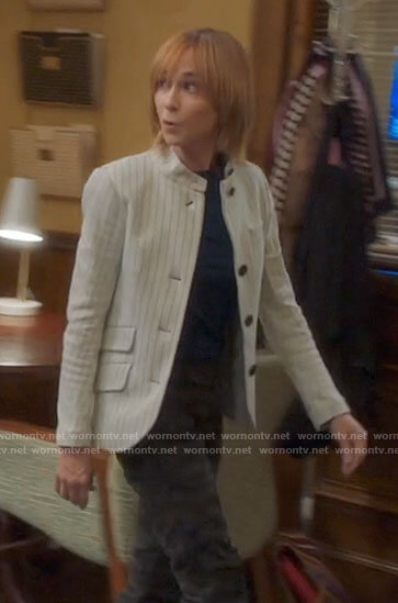Arpi's white pinstriped jacket on Mr Mayor
