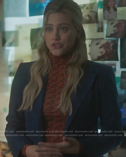Betty's orange printed turtleneck top and blue blazer on Riverdale