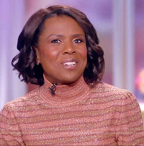 Deborah Roberts's metallic striped turtleneck sweater on The View
