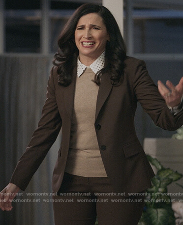 Delia's brown blazer and pants on The Unicorn