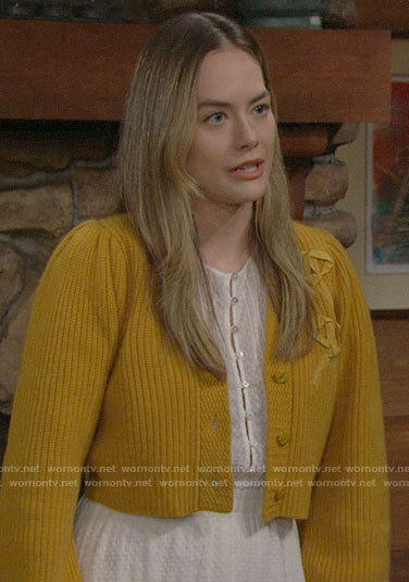 Hope's yellow cardigan with bows and white dress on The Bold and the Beautiful