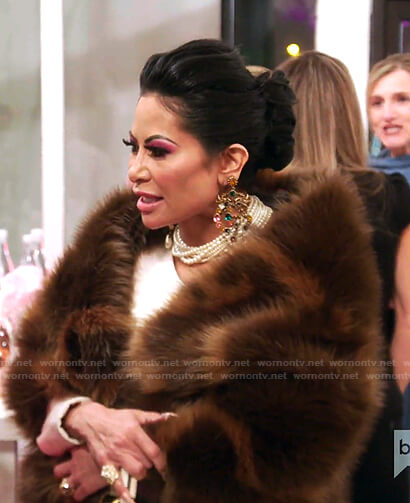 Jen's GG logo print fur jacket and earrings on The Real Housewives of Salt Lake City