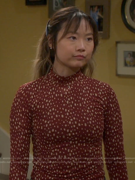 Jen's red dotted mock neck top on Last Man Standing