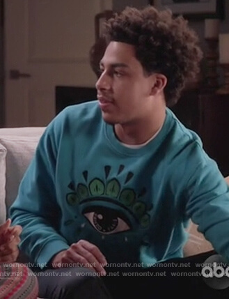 Junior's blue eye embroidered sweatshirt on Black-ish