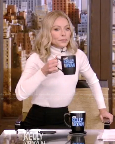 Kelly's white turtleneck sweater and black skirt on Live with Kelly and Ryan