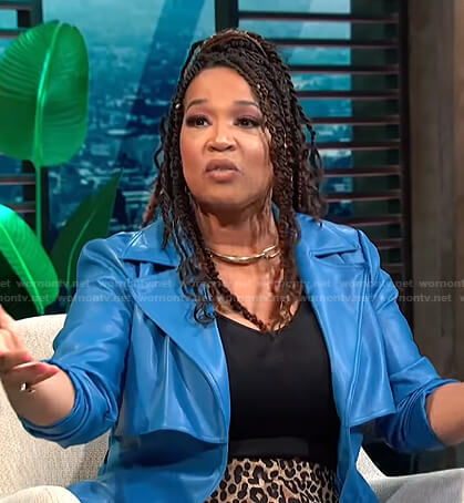 Kym's blue leather trench coat on E! News Daily Pop