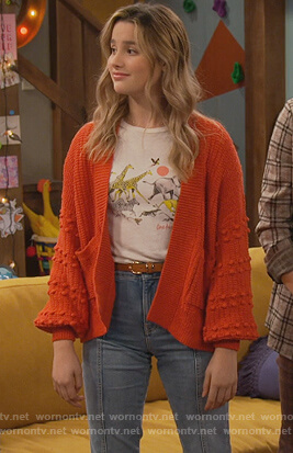 Lex's orange bobble cardigan on Side Hustle