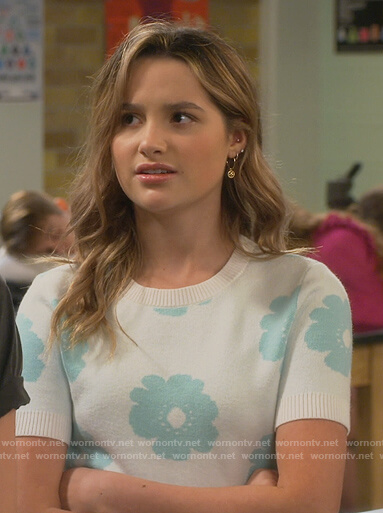 Lex's white daisy print short sleeve sweater on Side Hustle