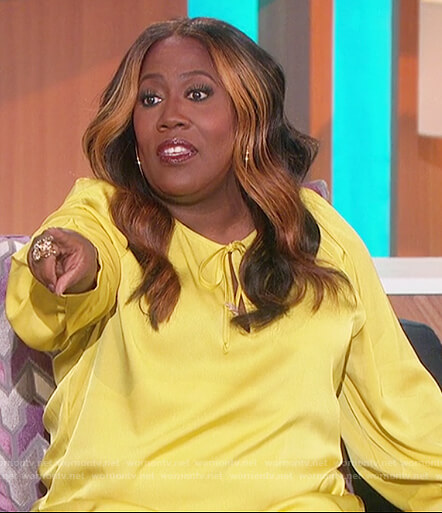 Sheryl's yellow satin tie neck blouse on The Talk
