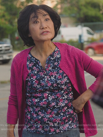Umma's blue floral print blouse on Kims Convenience