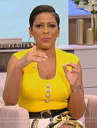 Tamron's yellow button embellished top on Tamron Hall Show